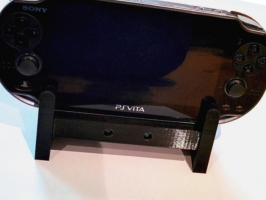 Image of Подставка для PS Vita  с гнездом для зарядника